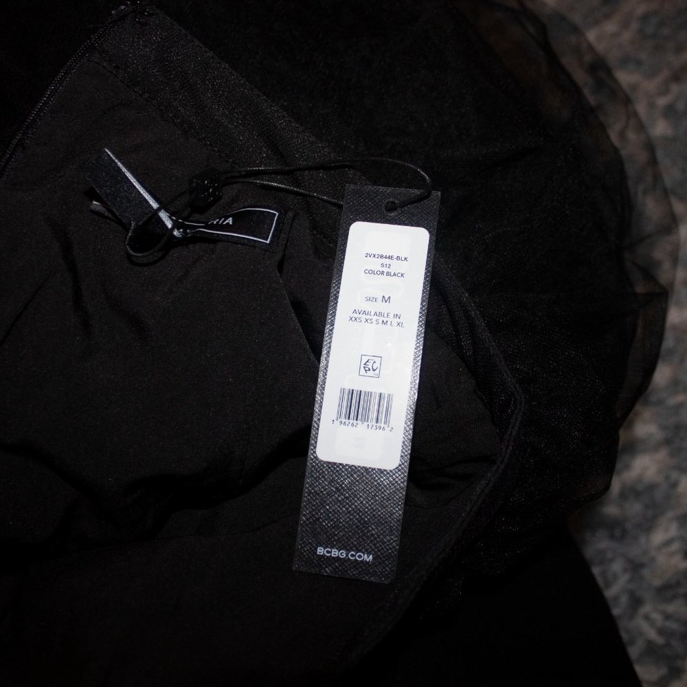 SOLD
BCBGMAXAZRIA
Tiered Tulle Ruffle Skirt - Picture 11 of 11